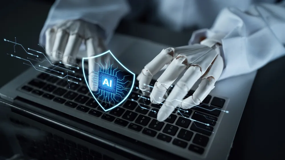 AI agent typing on a computer with holographic image of AI in blue