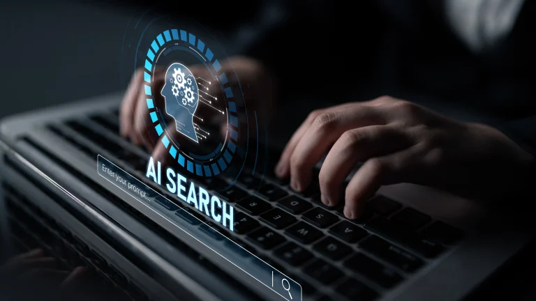 ai search, hands typing on computer for ai results