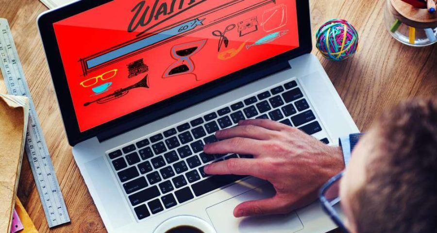 Man waiting for slow website to load