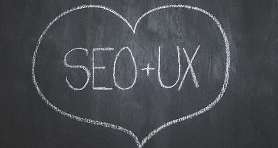 seo and ux written on chalkboard inside a heart