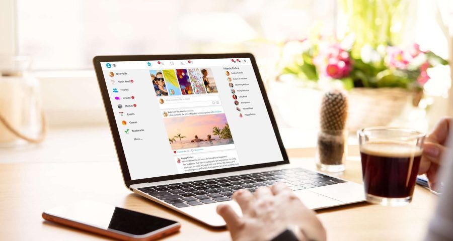 woman using social media on laptop