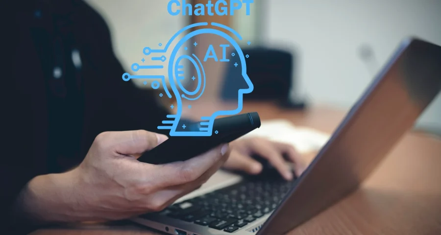 someone holding their phone with a ChatGPT Chat with AI icon above.