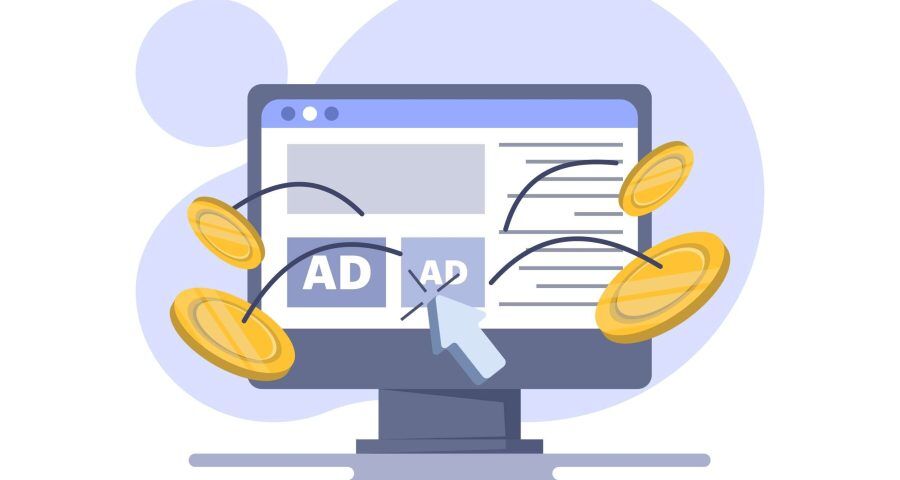 Paid ad graphic on laptop with gold coins