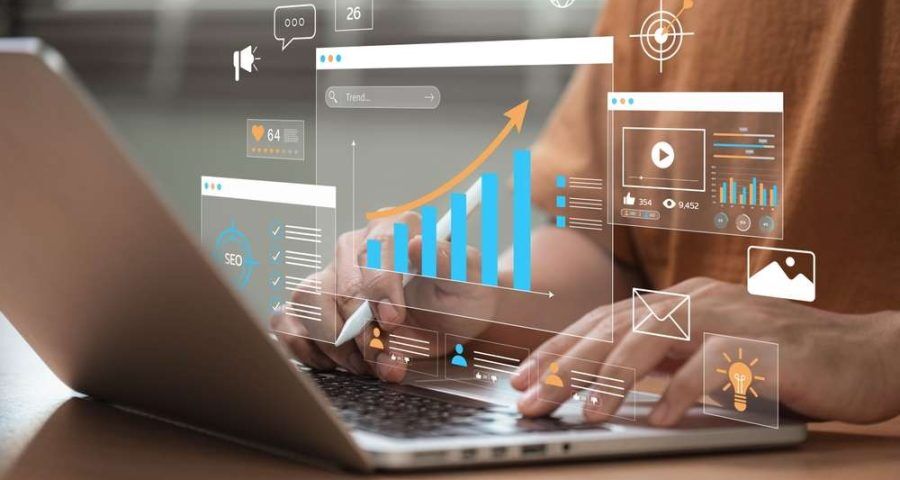 marketing content plan on a laptop with holographic bar graph