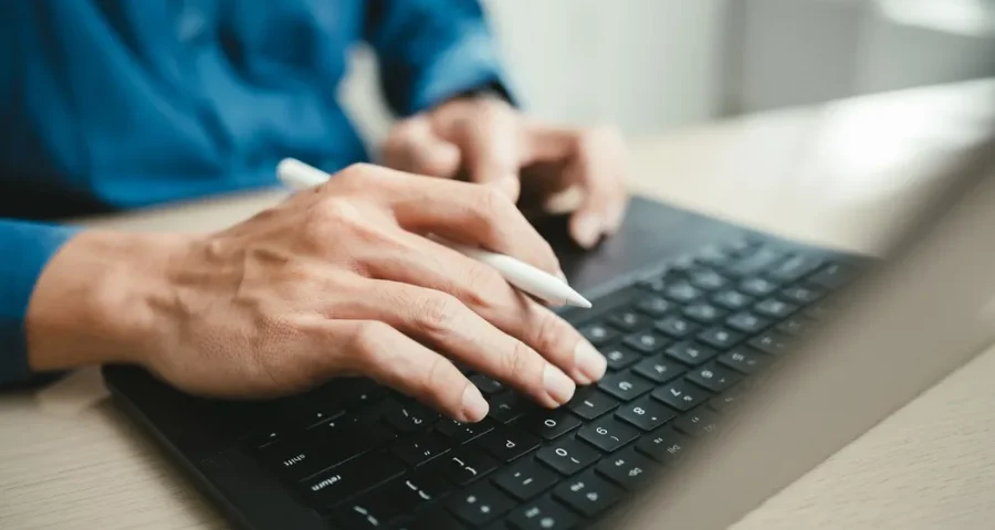 man writing blog